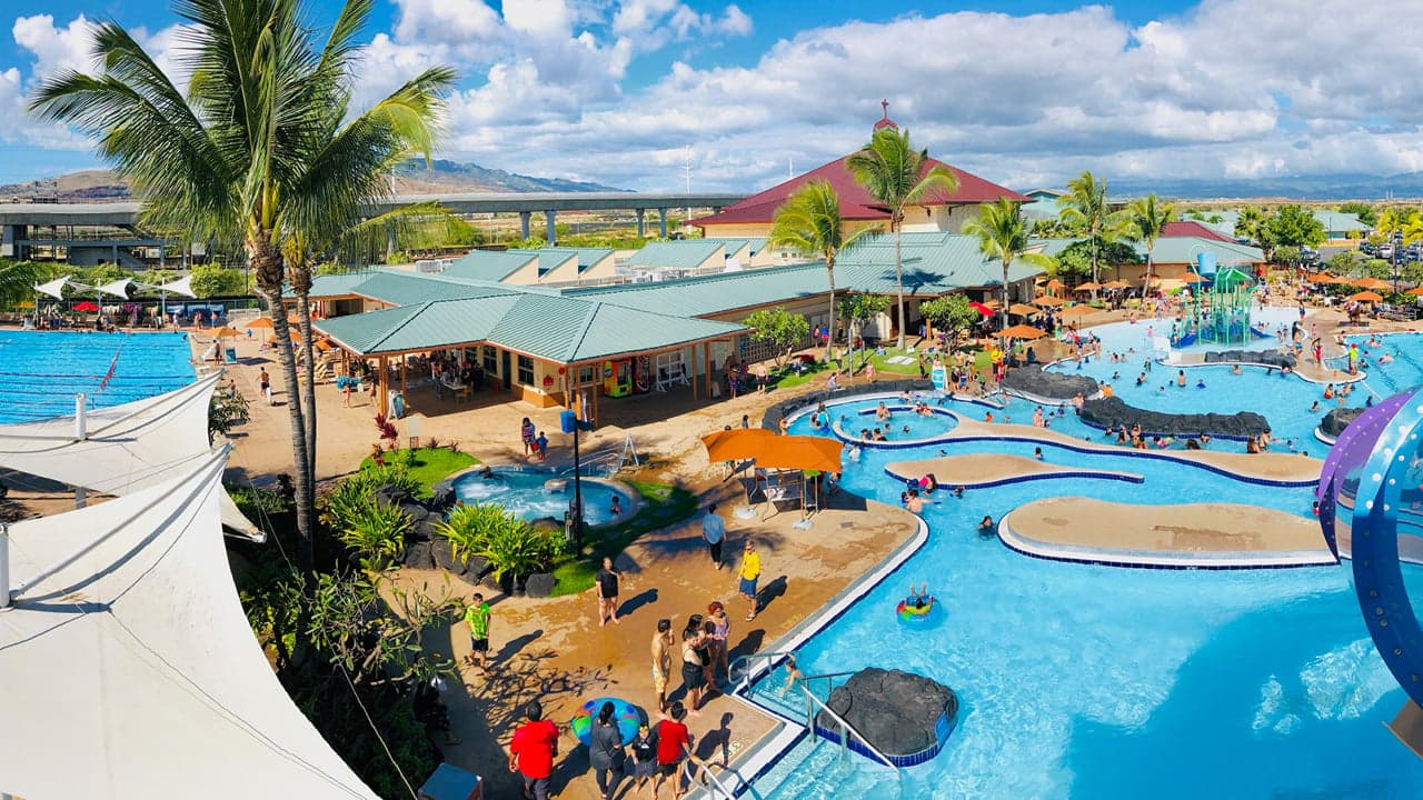The Salvation Army Kroc Center building and outdoor pools.